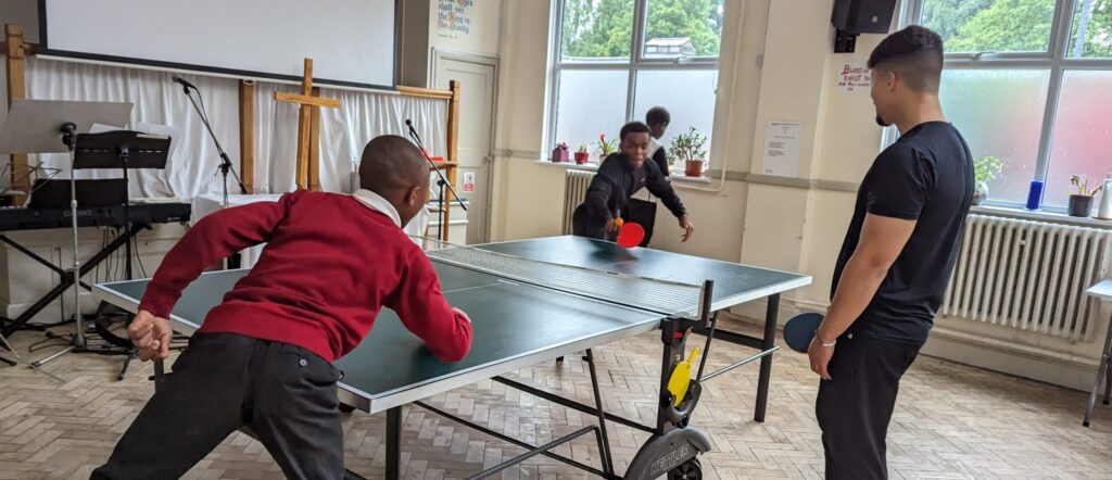 Youth and Leaders Playing Table Tennis.